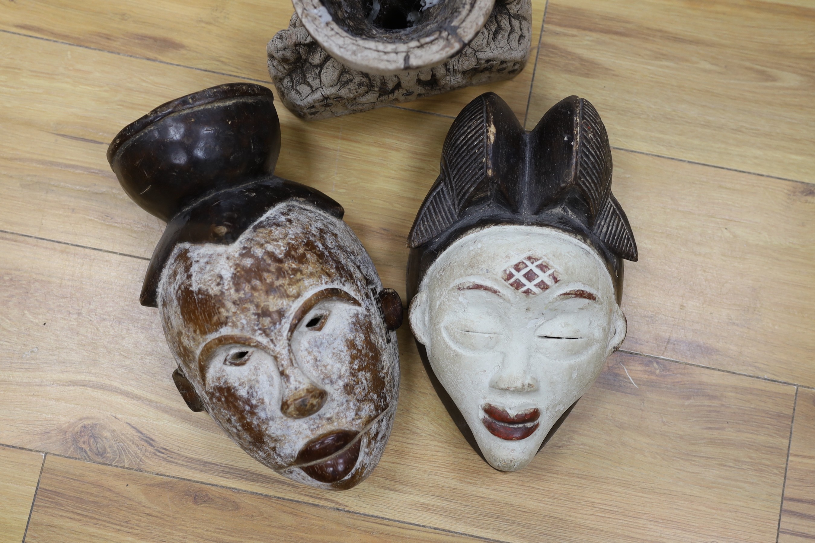 The Two African masks and another carving, tallest mask 30cm high